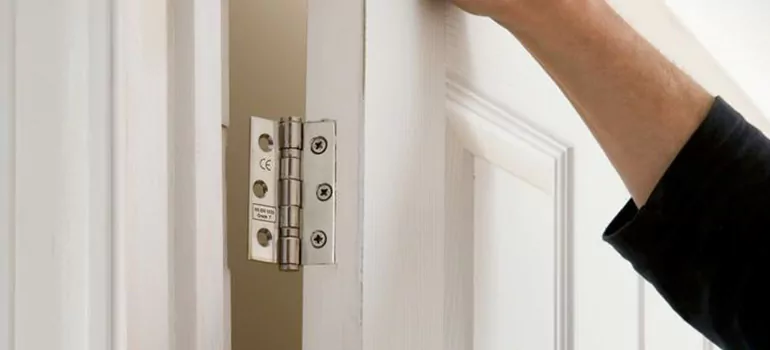 Bathroom Stall Door Hinge Repair in West End, BC